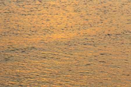 Beautiful sea water at sunsetの写真素材
