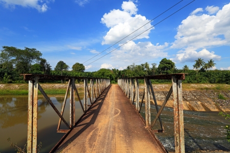 Bridge across river dam, diverting water for farmland irrigation purposesの写真素材