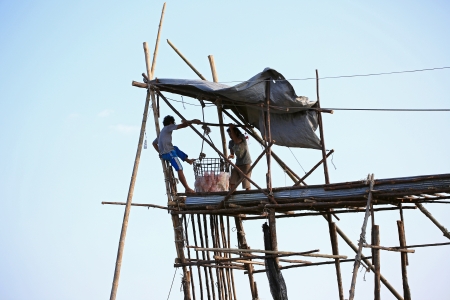 KRABI, THAILAND - JANUARY 29 : Local fishermen process jellyfish catch in Andean sea near Ao Thalane on January 29, 2013 in Krabi, Thailand. のeditorial素材