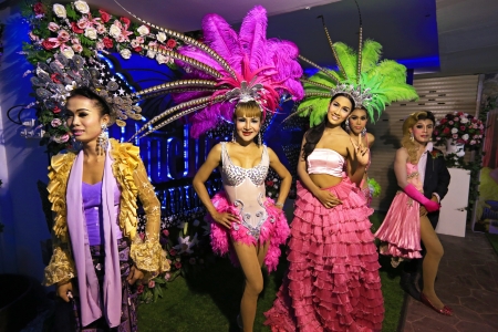 KRABI, THAILAND - FEBRUARY 17: Cabaret show dancers greet tourists outside show venue on February 17, 2013, in Krabi, Thailand. のeditorial素材
