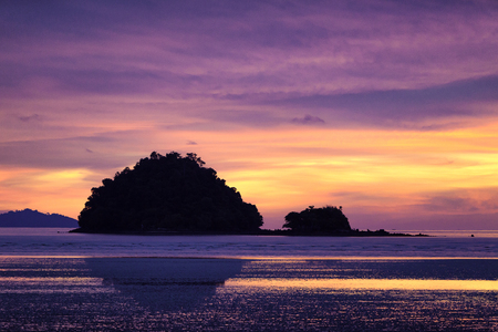 Beautiful sunset on the Pak Meng Beach, Trang, Thailand.の写真素材