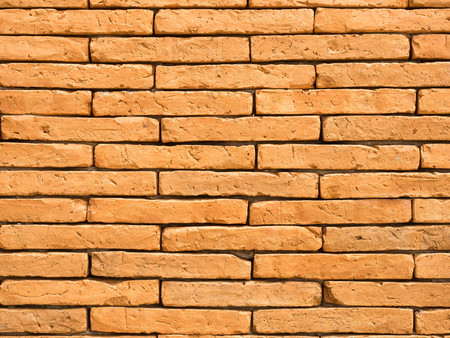 New orange brick wall for room or building designの写真素材