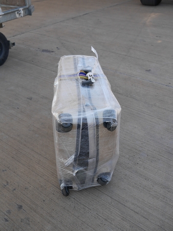 completely damaged suitcaseの写真素材