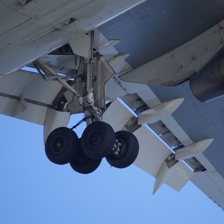 Closeup of airplane landing