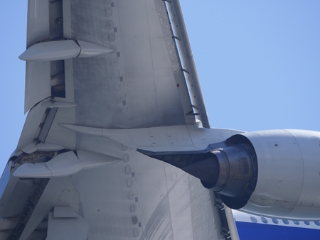 Closeup of airplane landingの写真素材