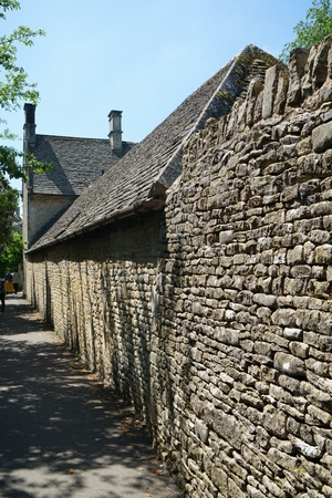 Honey-colored stone wall at Bourton on the waterの写真素材
