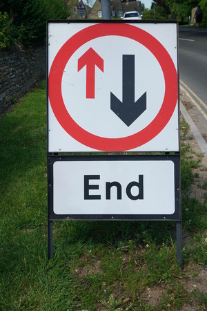End road sign in English villageの写真素材