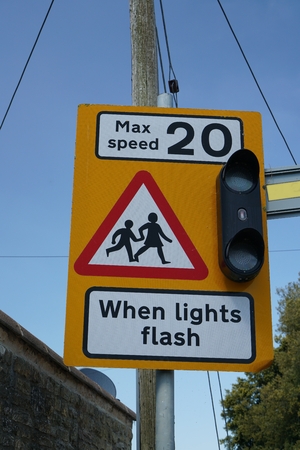 Speed limit road sign in English villageの写真素材
