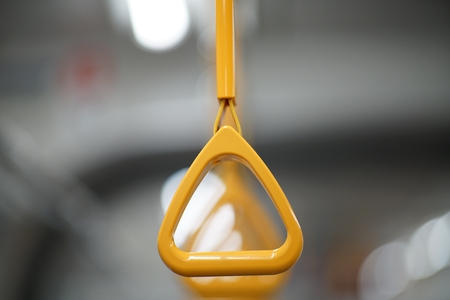 Train strap. Scenery inside the train.の写真素材