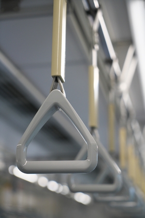 Train strap. Scenery inside the train.の写真素材