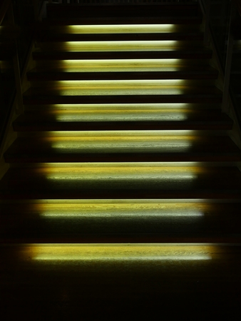 Illuminated wooden staircaseの写真素材