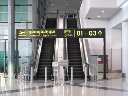 Phnom Penh, Cambodia-December 24, 2017: An escalator from international departure to domestic departureのeditorial素材