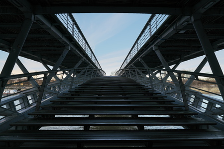 Paris, France-January 19, 2018: Water surface of Seine river is accessible with the steps below Leopold-Sedar-Senghor footbridge, which links the Orsay museum and the Tuileries Garden,...のeditorial素材