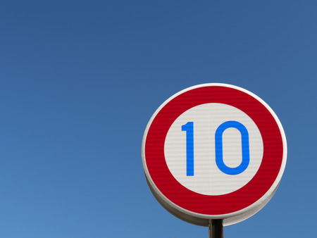 Tokyo, Japan-March 1, 2018: Road sign, Speed limit 10 km per hourの写真素材