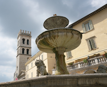 Assisi, Italy-July 28, 2018: Fonte di Piazza del Comune, Assisiのeditorial素材