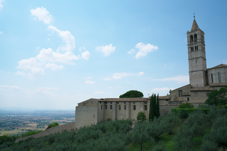 Assisi, Italy-July 28, 2018: View of Basilica di Santa Chiara or Basilica of St. Clare from Borgo Aretino street, Assisiのeditorial素材