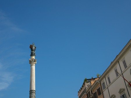 Rome, Italy-July 27, 2018: Column of the Immaculate Conception carrying a wreath of flowersのeditorial素材