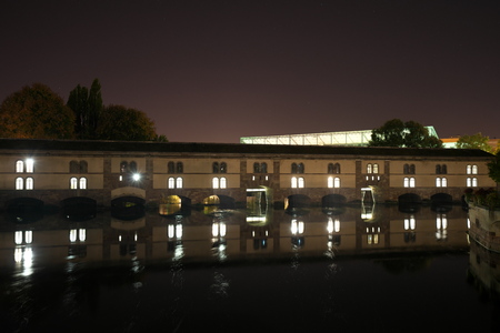 Strasbourg, France-October 13, 2018: the Vauban Dam or the the Great Lock or the Barrage Vauban is a bridge, weir and defen SIVE work erected in the 17th century on the River Ill in Strasbourg, Franceのeditorial素材