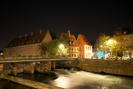 the Vauban Dam or the the Great Lock or the Barrage Vauban is a bridge, weir and defen SIVE work erected in the 17th century on the River Ill in Strasbourg, Franceの写真素材