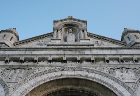 Paris, France-October 17, 2018: A facade and a statue of Jesus Christ of Sacre Coeur in Montmartre, Parisのeditorial素材