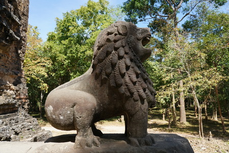 A statue of lion at Prasat Tao in Sambor Prei Kuk in Cambodiaの写真素材