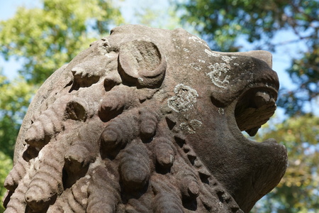A statue of lion at Prasat Tao in Sambor Prei Kuk in Cambodiaの写真素材