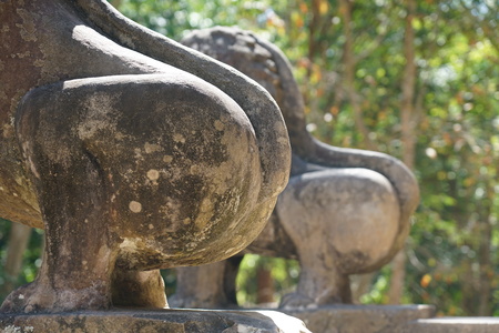 A statue of lion at Prasat Tao in Sambor Prei Kuk in Cambodiaの写真素材