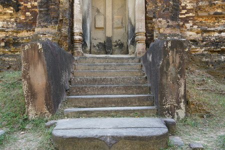 Ruined base of lion statue legs at Prasat Tao in Sambor Prei Kuk in Cambodiaの写真素材