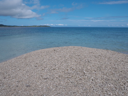 Okinawa, Japan-May 31, 2019: Barasu Island, formed with pieces of coral: a very very small desolate island located north of Iriomote Island.の写真素材