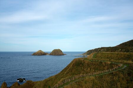 Niigata,Japan-October 20, 2019: Futatsugame island or two turtles island in Sado island.の写真素材