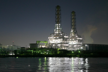 Tokyo,Japan-December 1, 2019: Night View of Heat Power Plants Viewed from a Boat in Kawasaki Show After the Sunsetのeditorial素材