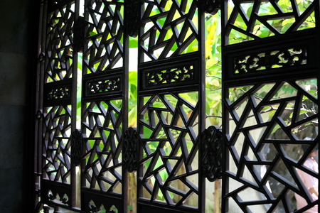 Suzhou,China-September 14, 2019: Lattice window or ornamental window in LiuYuan garden or Lingering garden, one of the wor ld heritage in Suzhou, Chinaのeditorial素材