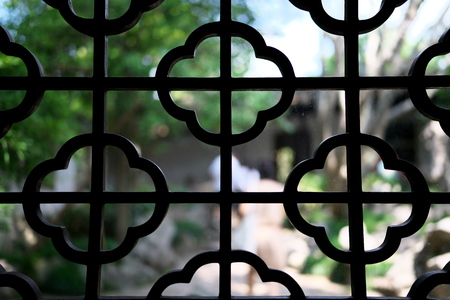 Suzhou,China-September 14, 2019: Lattice window or ornamental window in LiuYuan garden or Lingering garden, one of the wor ld heritage in Suzhou, Chinaのeditorial素材