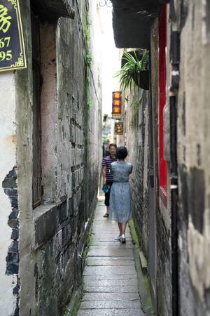 Xitang,China-September 13, 2019: Shipi Lane, the narrowest alley in Xixia street, Xitang, Chinaのeditorial素材