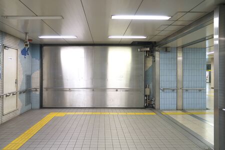 Aichi,Japan-January 14, 2020: Watertight door or waterproof door to block sea water flowing into the subway station in Nagoya, Japanの写真素材