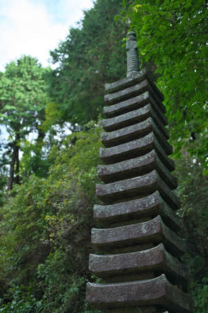 Kyoto,Japan-October 11, 2020: Thirteen-storied stone tower at Gansenji temple in Kizugawa, Kyotoのeditorial素材