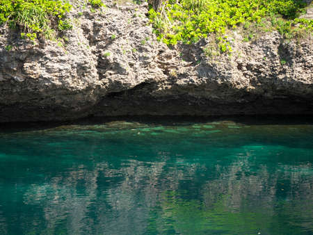 Okinawa,Japan-October 26, 2020: Closeup of the wall of Tori-ike Pond, Shimojishima island, Okinawaの写真素材