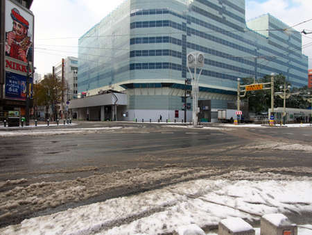 Hokkaido,Japan-November 11, 2020: Snow covering Susukino intersection, the most busy area in Sapporo City, Hokkaidoのeditorial素材