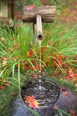 Stone washbasin or font for cleaning hands or Chozubachi
