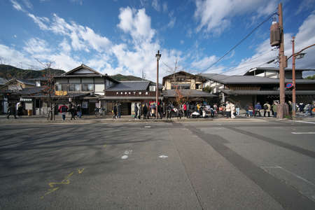 Kyoto,Japan-November 22, 2020: Tourists walking along Arashiyama main street in autumnのeditorial素材