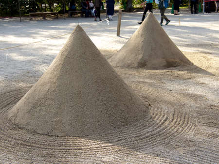 Kyoto,Japan-March 31, 2021: Closeup of Tatezuna, cone-shaped sand with pine needles atop, in...