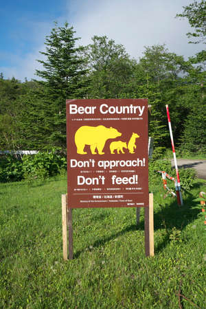 Hokkaido,Japan - June 21, 2021: Beware of wild brown bears board in Shiretoko, Hokkaido, Japanのeditorial素材