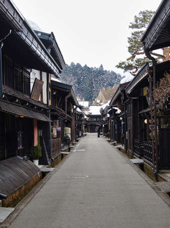 Gifu, Japan - February 19, 2022: Old township or Historical Building Preservation Area in snow in Takayama City, Japanのeditorial素材