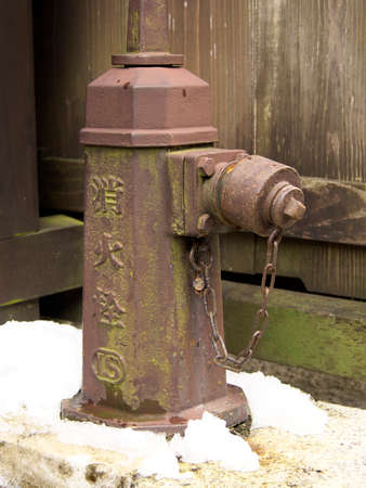 Gifu, Japan - February 19, 2022: A Fire Hydrant in snow in Takayama City, Japanのeditorial素材