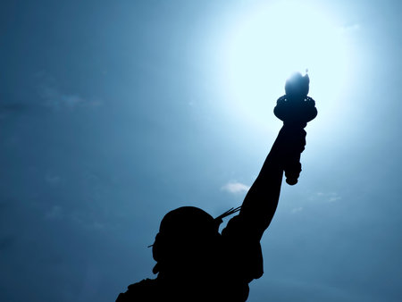 Tokyo,Japan - October 9, 2022:ãSilhouette of the Statue of Liberty placed at Odaiba Seaside Park in Tokyo, Japanの写真素材