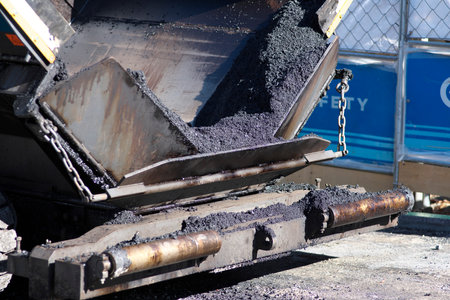 Tokyo,Japan - November 25, 2022: Front view of asphalt finisher