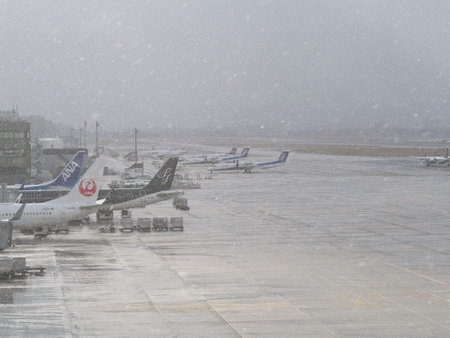 Fukuoka, Japan - December 23, 2022: Airport apron in snow in Fukuoka, Japanのeditorial素材