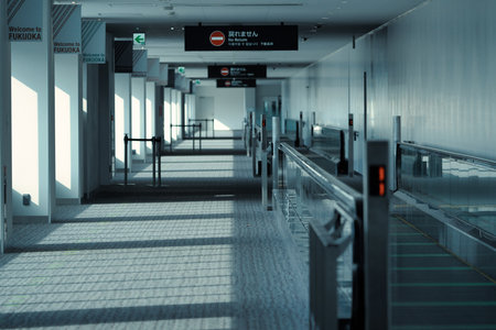 Fukuoka, Japan - December 20, 2022: Moving walkway at Fukuoka airport domestic terminal arrival gateのeditorial素材