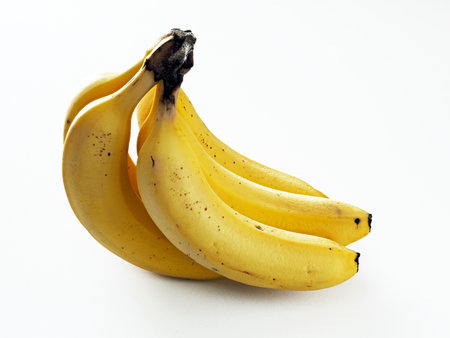 Tokyo, Japan - June 17, 2023: Closeup of bananas on white backgroundの写真素材