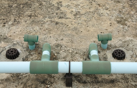 Symmetry old pipe connection with blackgroundの写真素材